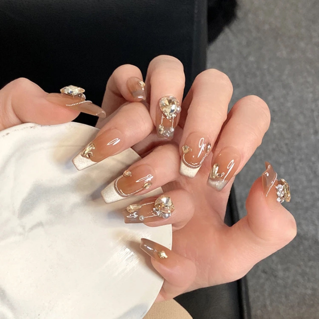 Top-tier luxury cat-eye French diamond Maillard color series handmade press-on nails by a nail art manufacturer